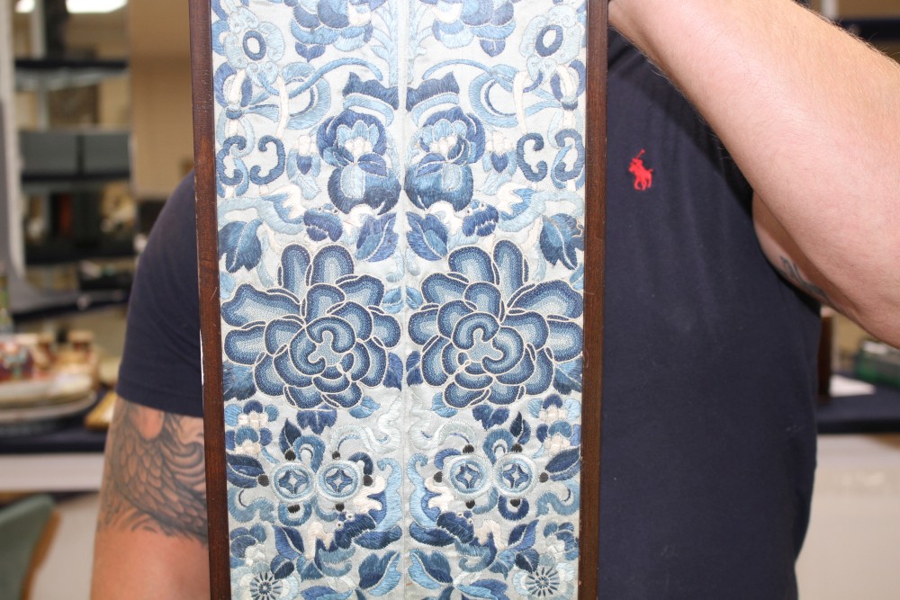 A Chinese silkwork double sleeve panel, 77 x 18cm overall, a smaller floral panel, 61 x 11cm and another, 34 x 26cm overall